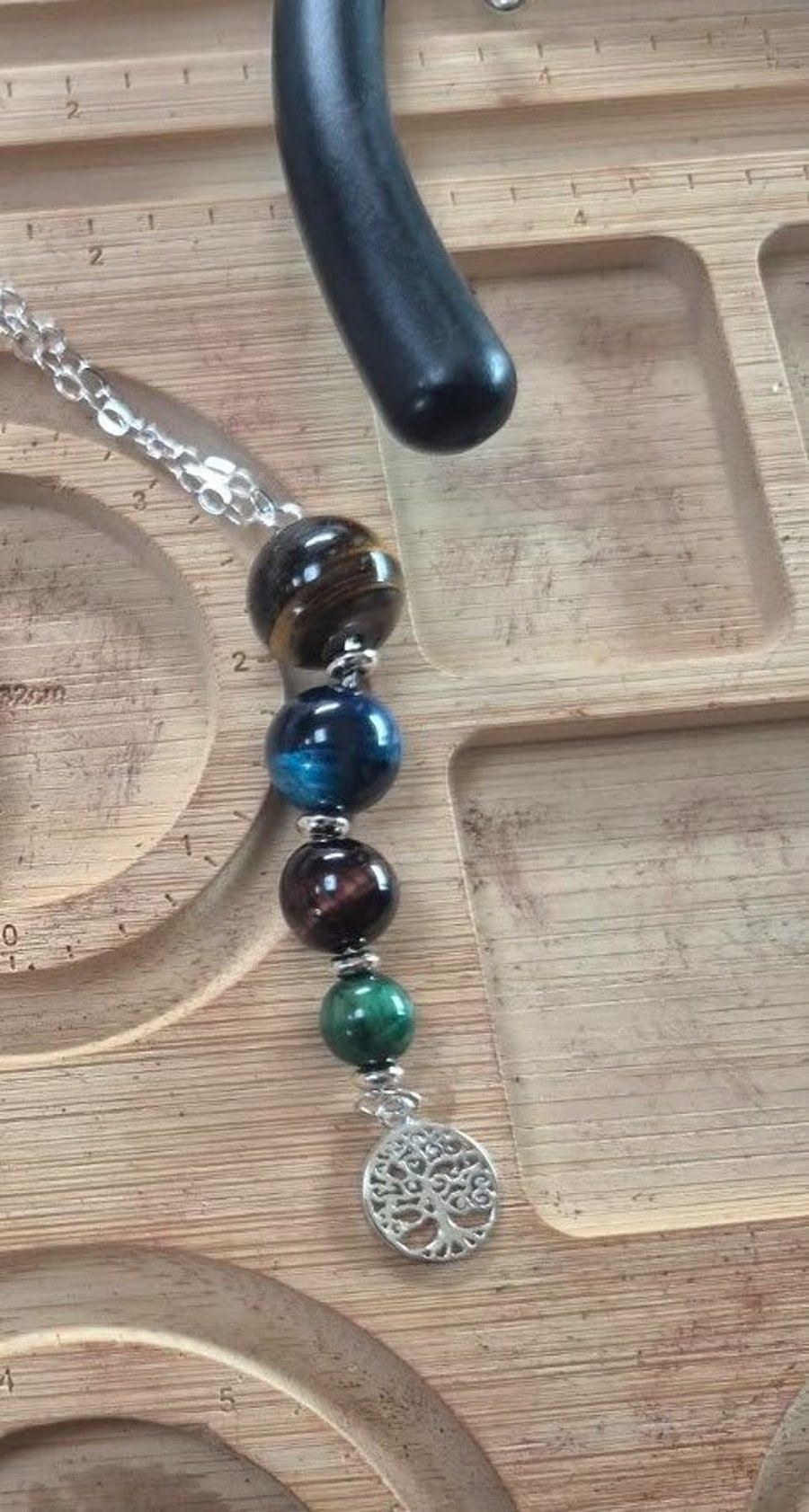 Roots & Radiance: Four Tigers Eye Necklace with Tree of Life Charm