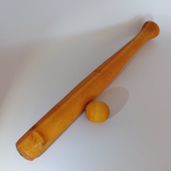 Wooden bat and ball
