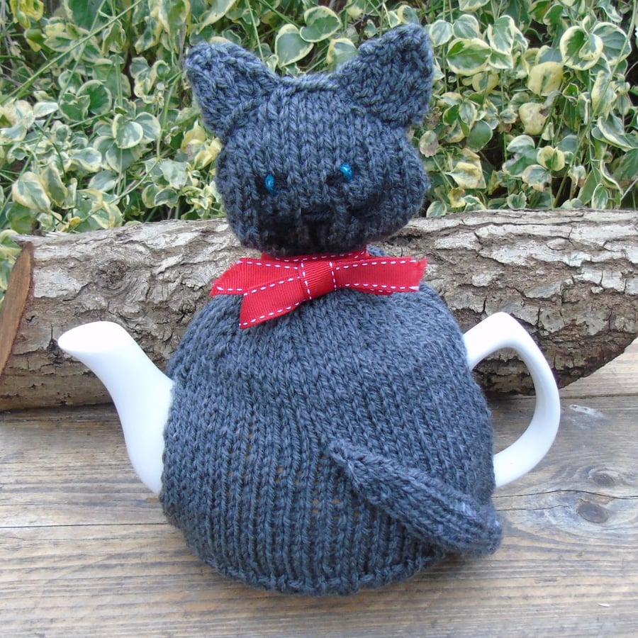Tea cosy,  hand knitted - to fit a large teapot  Grey cat with red bow