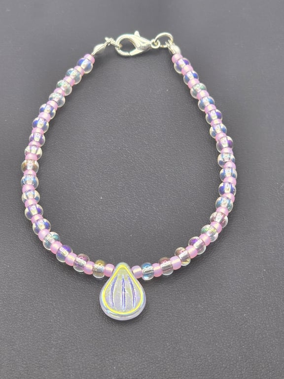 Crystal pip bead bracelet with clear crystal and rose seed beads