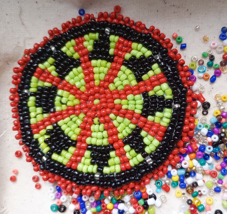 Green beaded Medicine Wheel Rosette pendant Geometric Native American inspired
