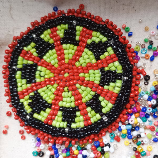 Green beaded Medicine Wheel Rosette pendant Geometric Native American inspired