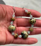 Raku spotted lampwork glass beaded necklace cream brown blue caramel - Image 8
