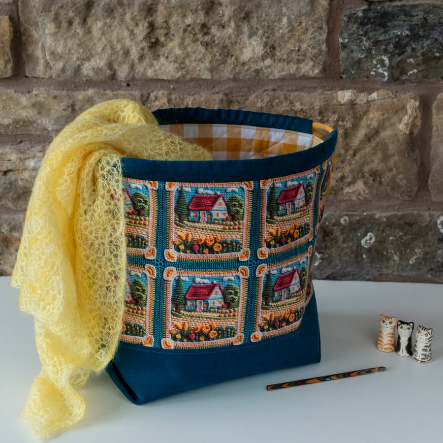 Project bag featuring crochet cottage panels - medium sized drawstring style