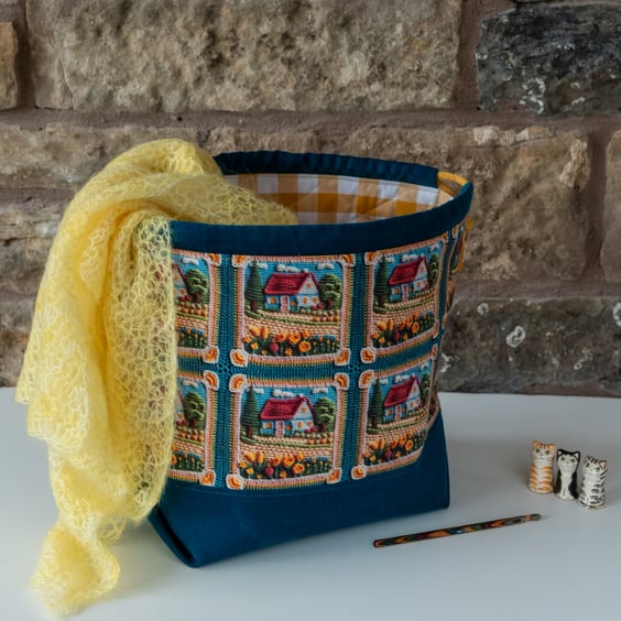 Project bag featuring crochet cottage panels - medium sized drawstring style