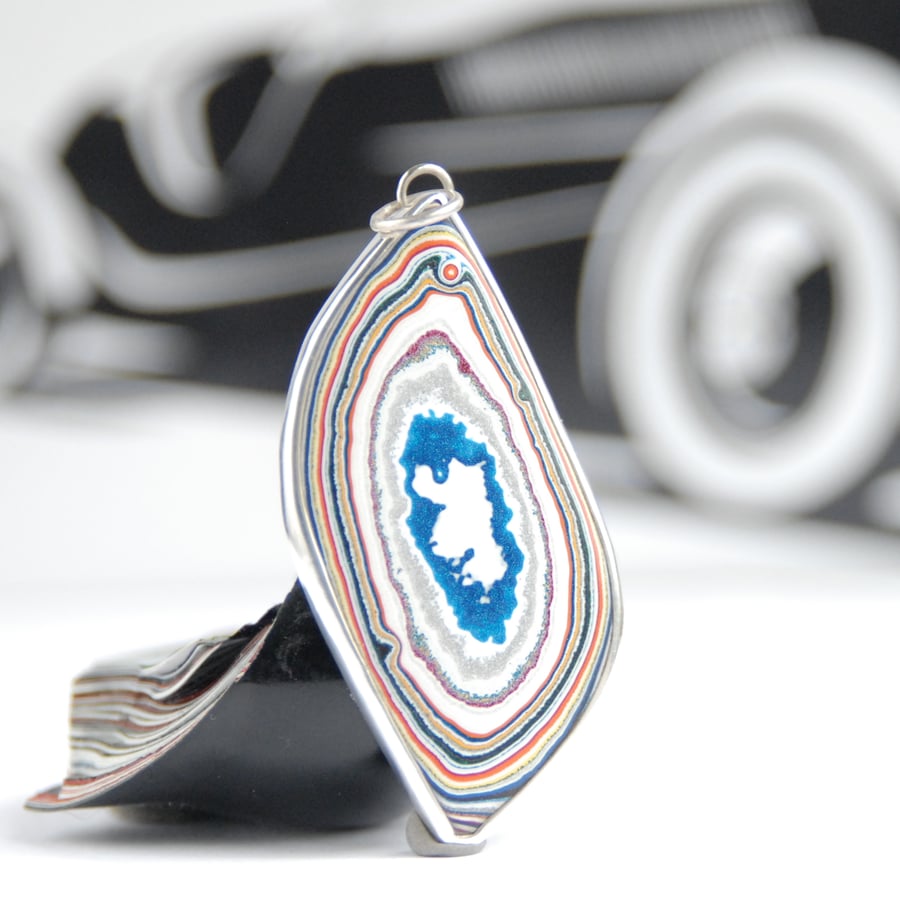 Vintage Dodge fordite pendant - free form shape