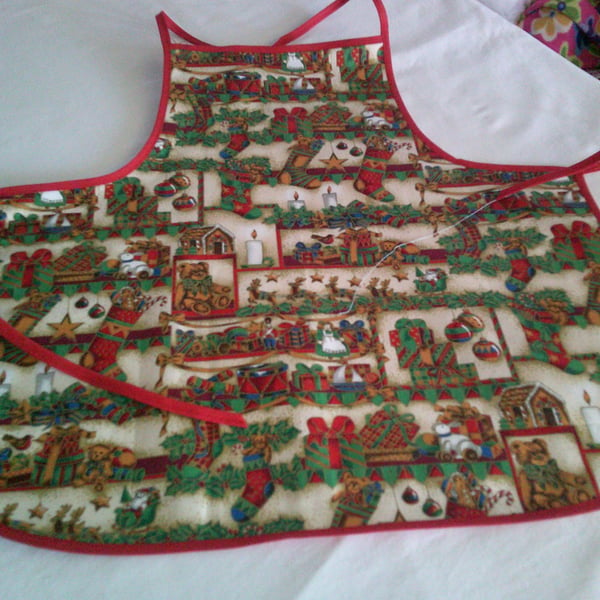Holly, Parcels, Toys and Stockings Baby Christmas Apron