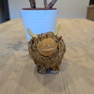 Ceramic highland cow sculpture 