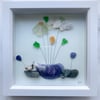 Framed ‘in bloom’ art made with Cornish beach finds 