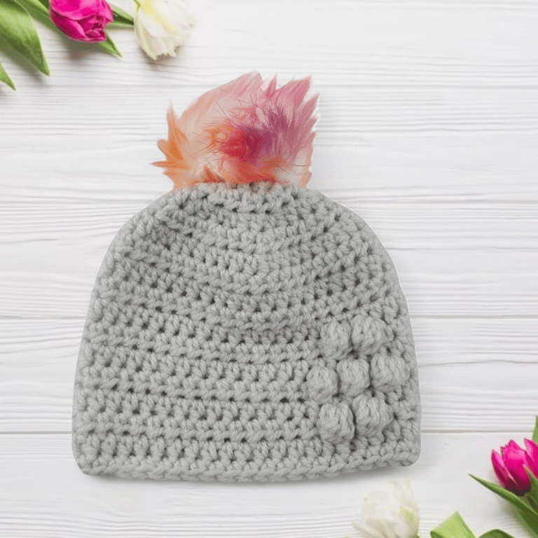Light grey baby crocheted hat white faux fur pompom with orange purple & pink 