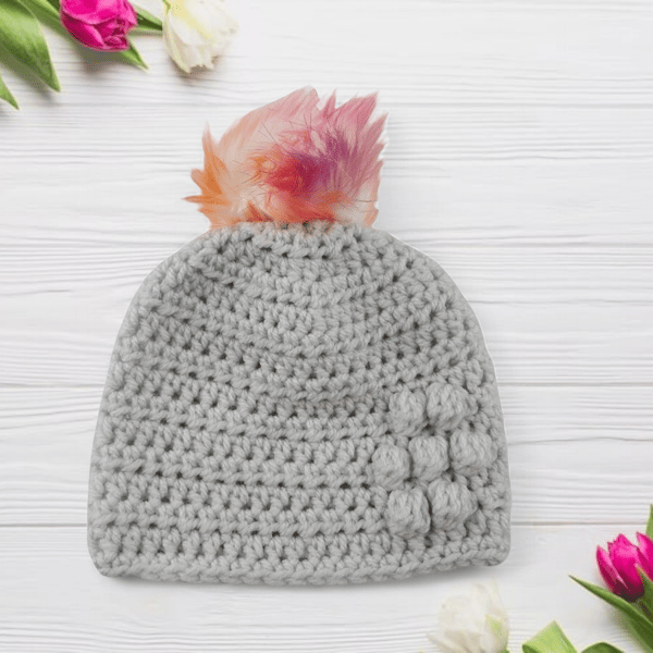 Light grey baby crocheted hat white faux fur pompom with orange purple & pink 
