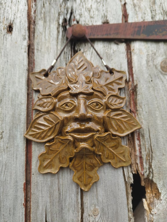 Green man ceramic wall plaque 