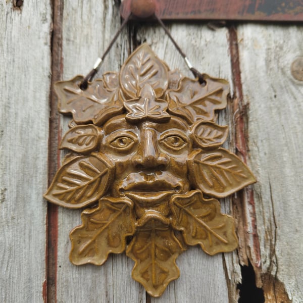 Green man ceramic wall plaque 