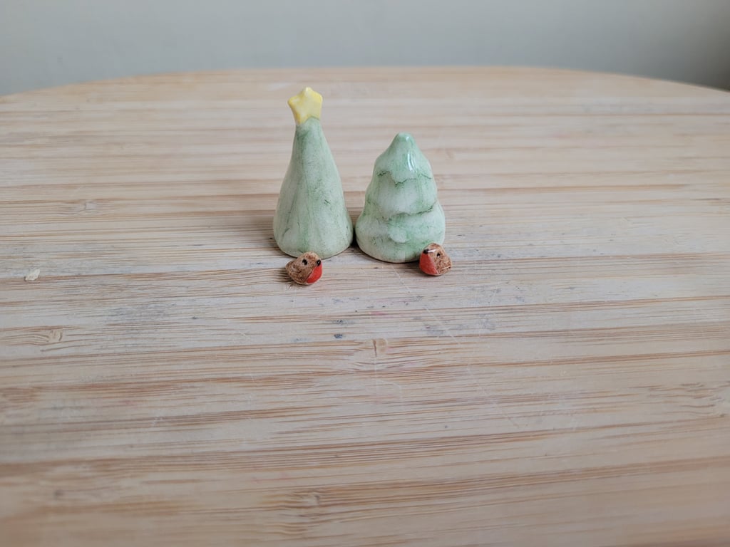 Miniature ceramic robin sculpture with Christmas tree, cake toppers or ornament 