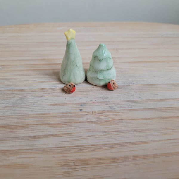 Miniature ceramic robin sculpture with Christmas tree, cake toppers or ornament 