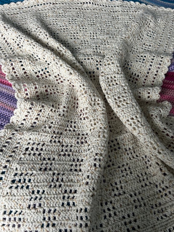 Neutral coloured crocheted blanket 