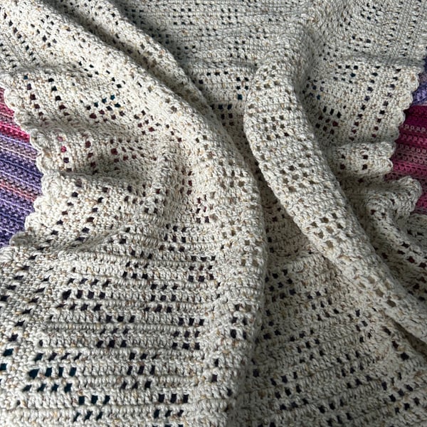Neutral coloured crocheted blanket 