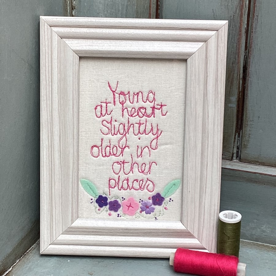 'Young at heart,slightly older in other places',embroidered picture