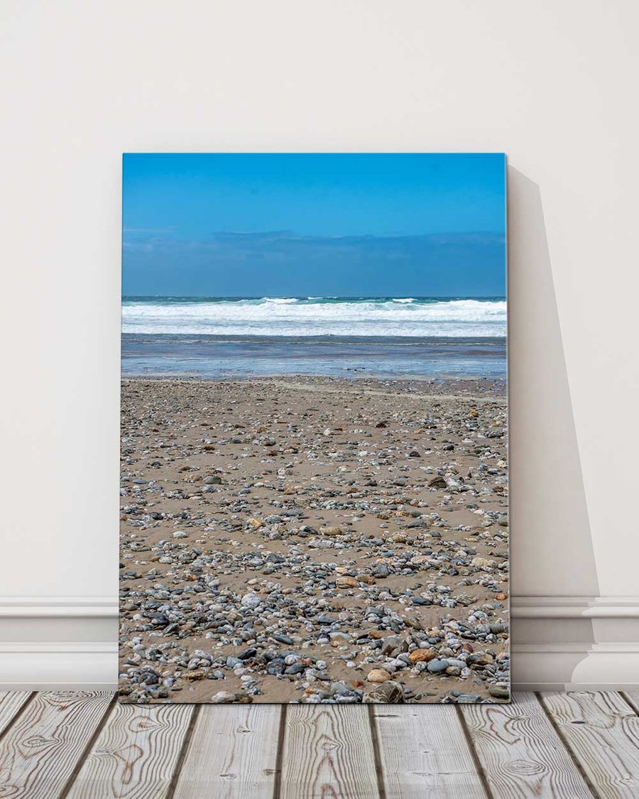 Pebbles on the beach. Rolling waves. Canvas picture print. 14"x10"(18mm depth)