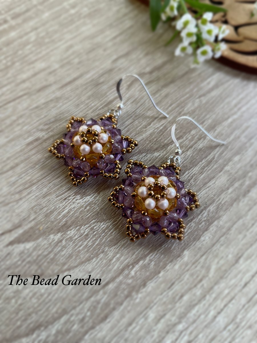 Beaded star flower earrings with sterling silver ear hooks 