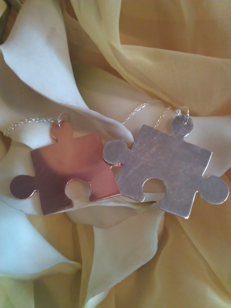 Missing piece duo sterling silver and copper necklaces