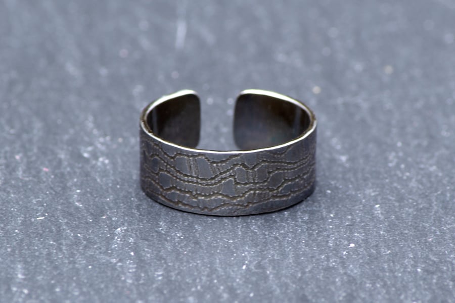 Textured silver cuff ring