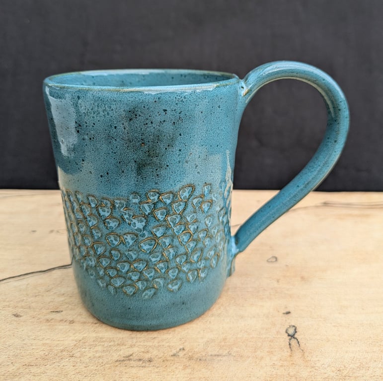 Turquoise carved mug