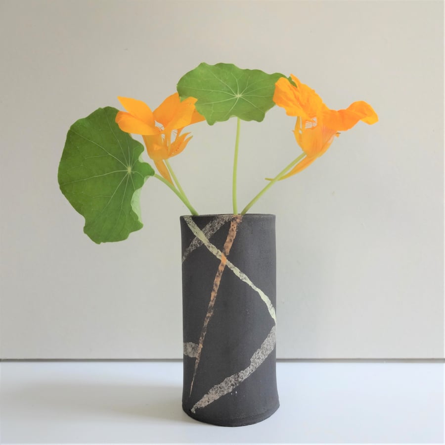 Scotty. Black ceramic vase for posy, herbs, or buds, abstract motifs.