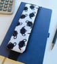 Elasticated pencil case for cover of notebook black and white teapots fabric