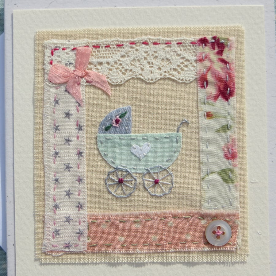 Little pram embroidered card to welcome a new baby, antique lace and mop button