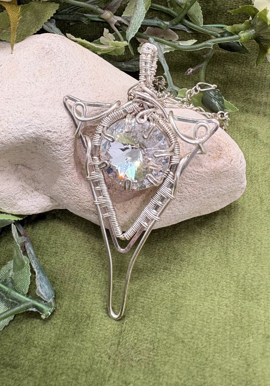 Elven inspired silver plated wire wrapped pendant