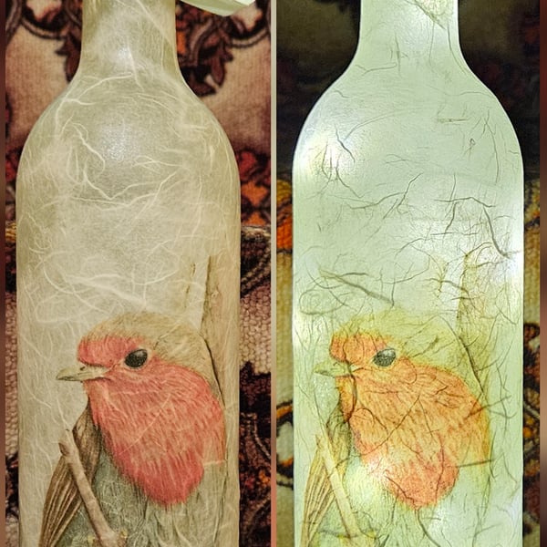 Tall, delicate robin bottle light