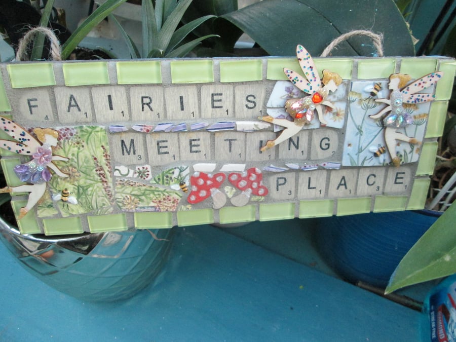 Mosaic sign Fairies meeting place.
