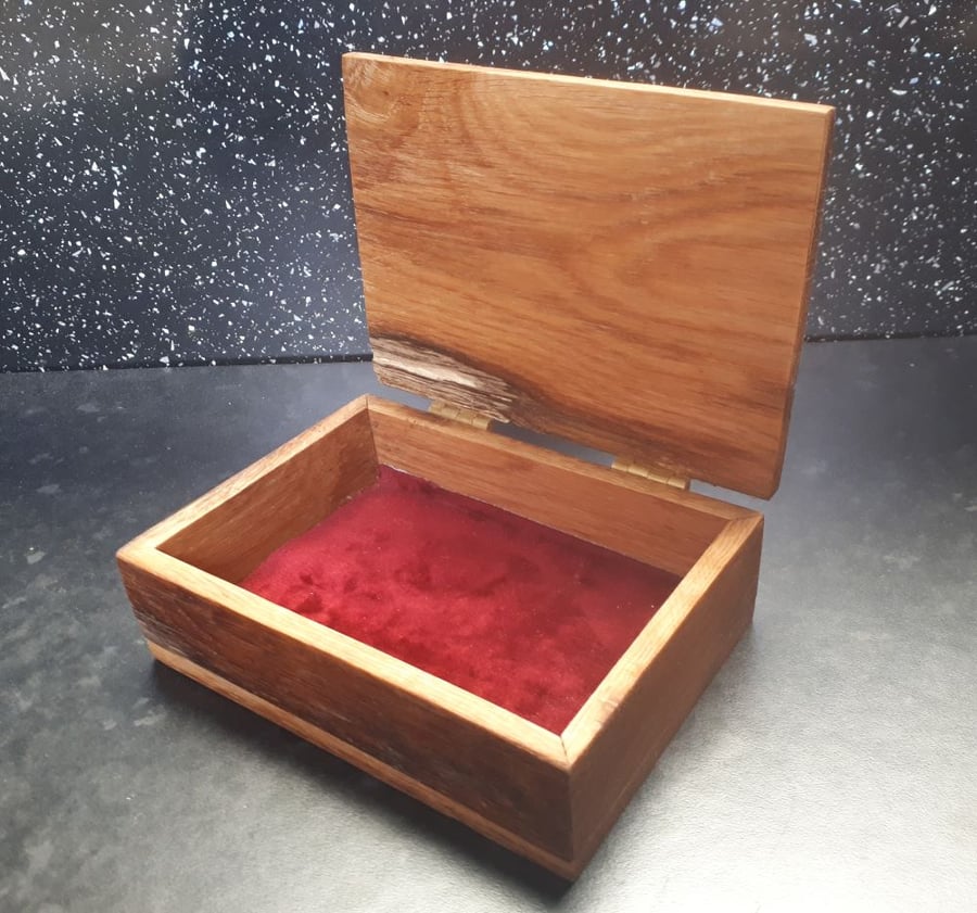 Small solid oak brass hinged box red velvet touch material lined 