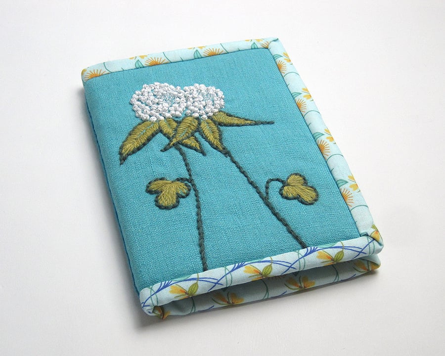 Notebook with hand embroidered clover