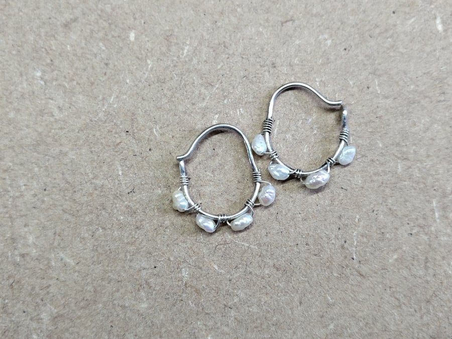 Silver hoop earrings wrapped with vintage freshwater pearls