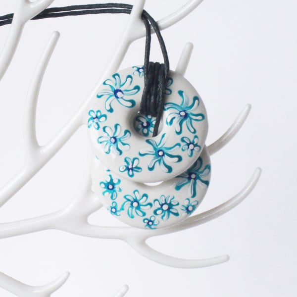 Hand Painted Blue and White Floral Double Stacked Donut Shaped Ceramic Pendant