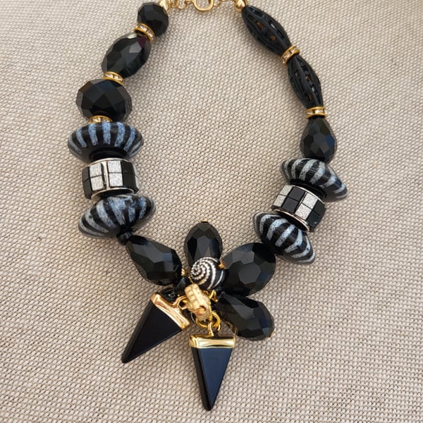 Chunky black and gold bracelet