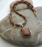 Tiger's Eye Freeform Pendant Necklace with Sterling Silver and Goldstone  - Image 3