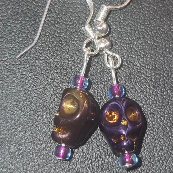 Dark Purple metallic skull earrings 