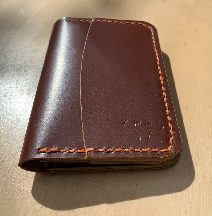 Leather wallet with six slots for cards and cash