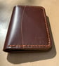 Leather wallet with six slots for cards and cash
