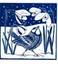 A freshly printed linocut card featuring snowdrops and a Great Tit