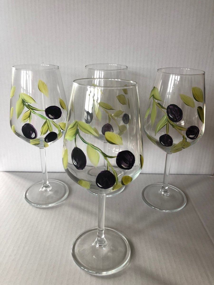 Set of 4 hand painted wine glasses depicting Olives