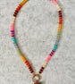 Colourful beaded necklace with heart pendant 