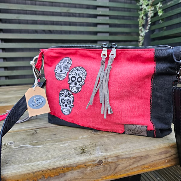 Black and red upcycled denim tote with sugar skull lining.