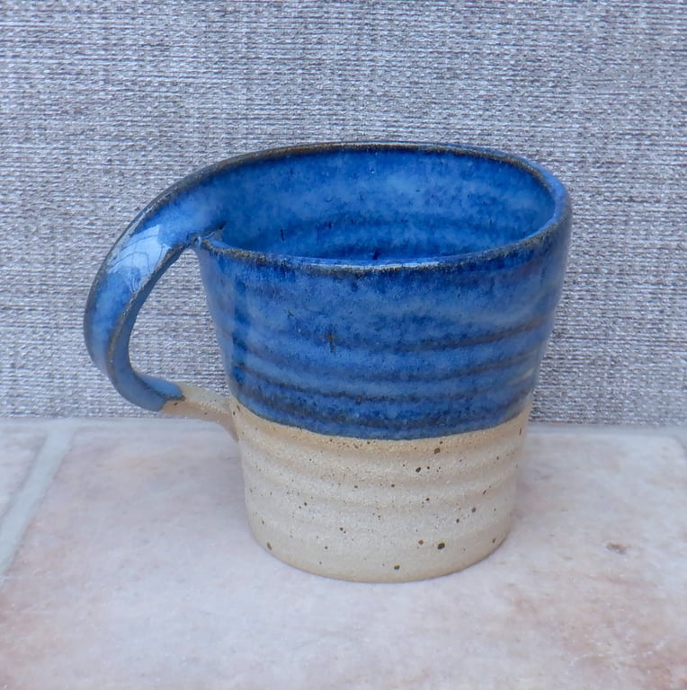 Left handed coffee mug tea cup in stoneware hand thrown ceramic pottery