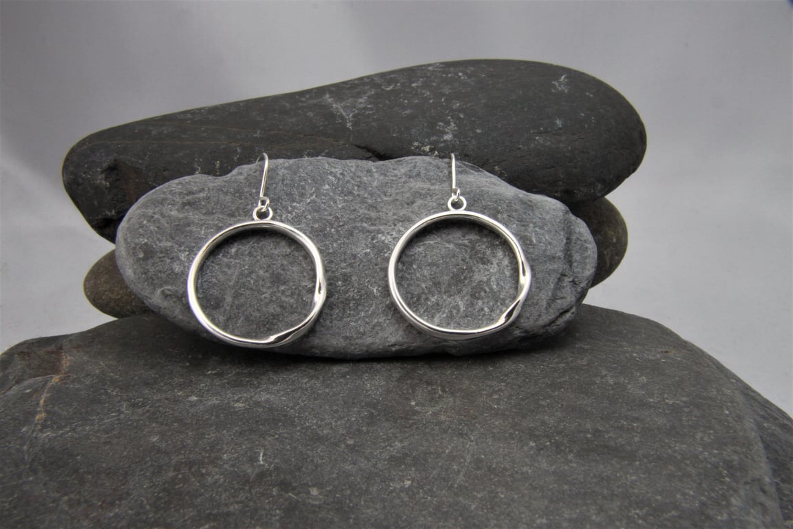 Rolling Waves Sterling Silver twisted hoop dangle earrings