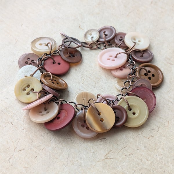 Earthy tones button bracelet with copper chain and toggle clasp 