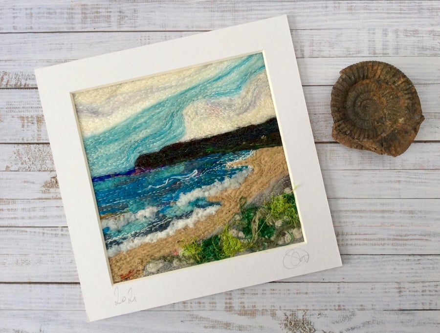 Embroidered needle felted seascape. 
